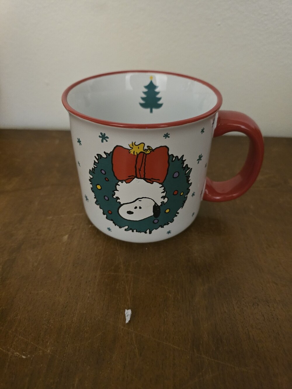 Peanuts Ceramic Mug with Red Handle and Green Accents